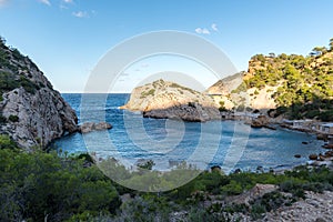 Turquoise waters in Es Portitxol, Ibiza, Spain. Hidden bay on the Island of Ibiza, in Sant Joan de Labritja. photo