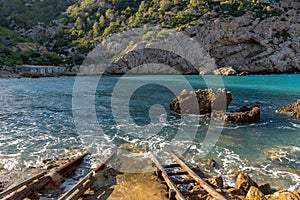 Turquoise waters in Es Portitxol, Ibiza, Spain. Hidden bay on the Island of Ibiza, in Sant Joan de Labritja. photo