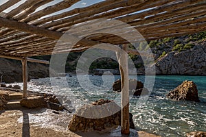 Turquoise waters in Es Portitxol, Ibiza, Spain. Hidden bay on the Island of Ibiza, in Sant Joan de Labritja. photo