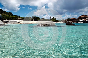 Turquoise waters, granite boulders and fine white sand