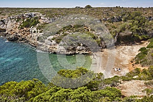 Turquoise waters in Mallorca. Bota cove. Panoramic mediterranean coastline. Balearic photo