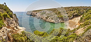 Turquoise waters in Mallorca. Bota cove. Panoramic mediterranean coastline. Balearic photo