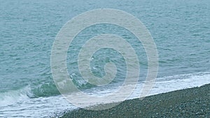 Turquoise Waves With Clear Water Surface Background. Beautiful Turquiose Sea Waves Breaking. Slow motion.