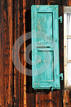 Turquoise window shutter