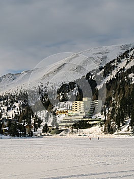 TURRACHER HÃ–HE, AUSTRIA - 6 FEBRUARY, 2023: Hotel Panorama next to a winter frozen lake in ski resort