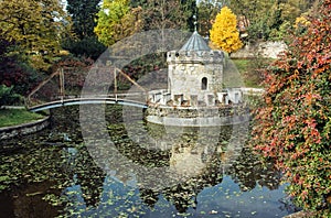 Turret in Bojnice, Slovakia, autumn park, seasonal colorful natural scene with lake