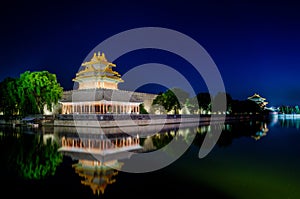 The turret of the forbidden city at dusk in beijing,China