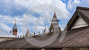 Turrets of the Rostov Kremlin against the background of a cloudy sky. photo