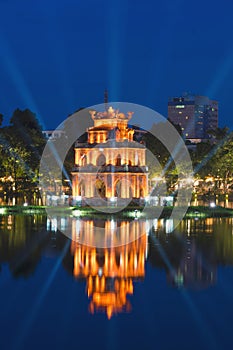 Turtle Tower, the symbol of ViTurtle Tower, the symbol of Vietetnam, at twilight period at Hoan Kiem lake or Ho Guom or Sword lake