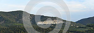 Tuscan hilly landscape defaced by a quarry