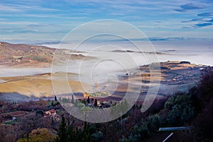 Tuscan landscape in the fog, Montepulciano (Italy)