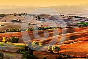 Tuscany countryside landscape at sunrise, Italy