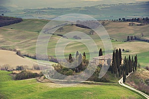 Tuscany Farmhouse and hills landscape