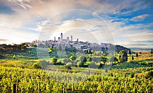 Tuscany landscape with the city of San Gimignano at sunset, Italy photo