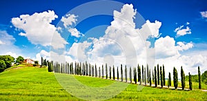 Tuscany landscape with farm house on a hill