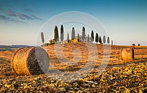 Tuscany landscape with farm house at sunset