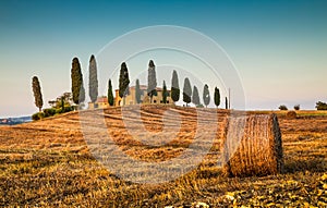 Tuscany landscape with farm house at sunset, Val d'Orcia, Italy