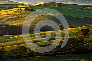 Tuscany landscape with fog. Sunrise morning in Tuscany landscape. Idyllic view of hilly meadow in Tuscany in beautiful morning