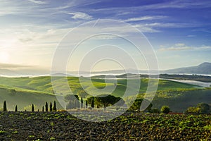 Tuscany - Landscape panorama at sunrise, hills and meadow, Italy