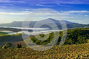 Tuscany - Landscape panorama at sunrise, hills and meadow, Italy