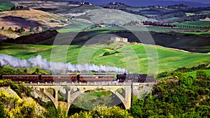 Tuscany nature steam train in spring time at wine festival