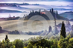 Tuscany villa in the misty valley