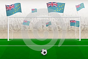 Tuvalu football team fans with flags of Tuvalu cheering on stadium, penalty kick concept in a soccer match