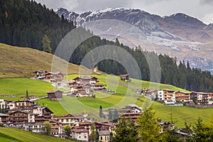 Tux village cityscape above Zillertal valley, Tyrol Snowcapped alps, Austria