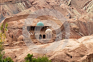 Tuyoq village Tuyuk: a Tomb in this traditional uighur village set in a lush valley cutting through the flaming mountains