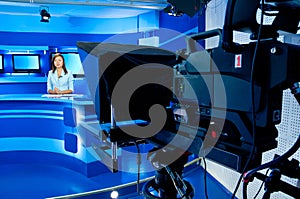 TV anchorwoman at TV studio photo