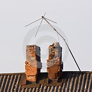 The TV antenna on the roof of the old