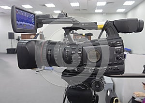 TV camera in the press conference room.