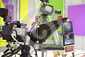 TV camera in the Studio. Teleprompter and professional high-definition video camera on a tripod