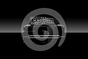 Tv decoder and remote control on black background. Receiver