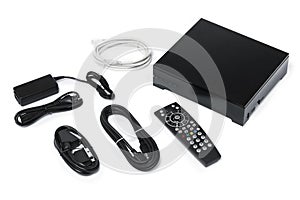 Tv decoder and remote control set isolated on white. Receiver