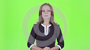 TV host tells the news program. Green screen
