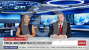 TV Live News Program: Two Professional Presenters Reporting On the Events. Television Cable Channel