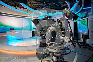TV NEWS cast studio with camera and lights photo