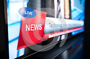 Tv news live broadcast and production concept. Breaking newscast on television. Screen close up of logo mockup, headline text.