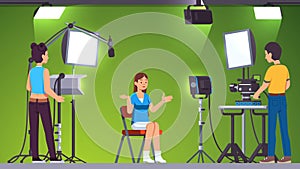 Tv presenter, cameraman, assistant in green studio