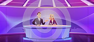 Tv presenters broadcasting news in modern studio