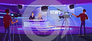 Tv presenters broadcasting news in modern studio