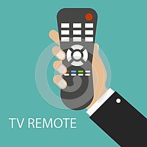 TV remote control. Distance control. Remote device. Hand holding TV remote. Green background. Vector illustration