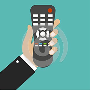 TV remote control. Distance control. Remote device. Hand holding TV remote. Green background. Vector illustration