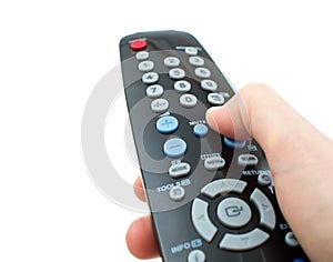 TV remote control in hand isolated closeup