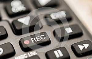 TV remote with recording button. Concept of show business, recording, and radio.