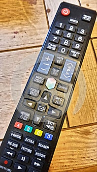 TV Remote on a wooden table