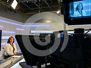 TV reporter at the news desk