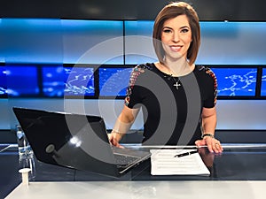 TV reporter at the news desk