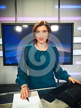 TV reporter at the news desk